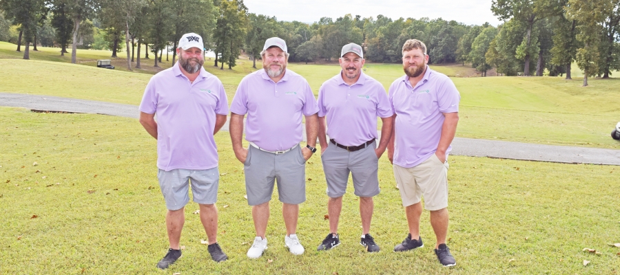 NEXT, Powered by NAEC's team won the championship flight of North Arkansas Electric Cooperative's Operation Round Up® Golf Classic. Pictured, from left, are Donny Dawson, Billy Jarrett, Keith Guffey and Willie Jarrett.  